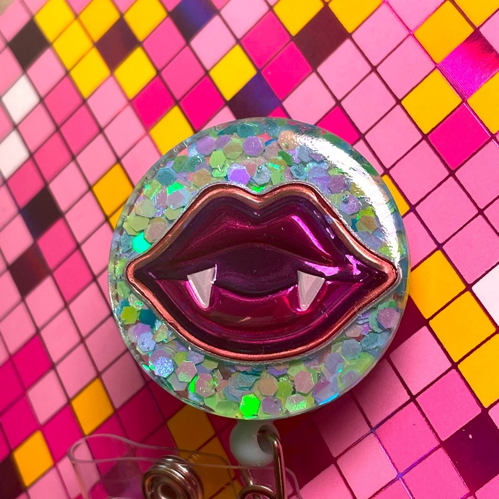 Vampire lips badge reel